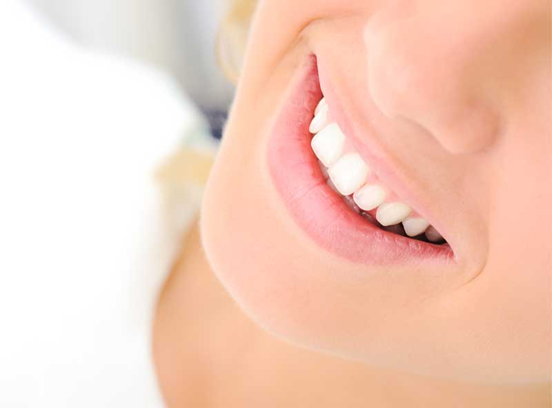A smiling woman.